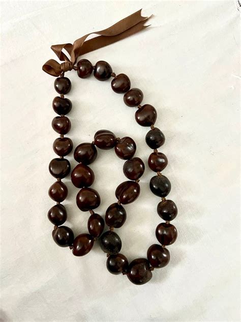 vintage ysl lrgeblack kukui nut necklace|648 results for vintage ysl necklace .